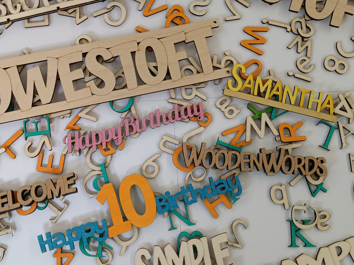 Examples of personalised wooden words, names and cut-out letters